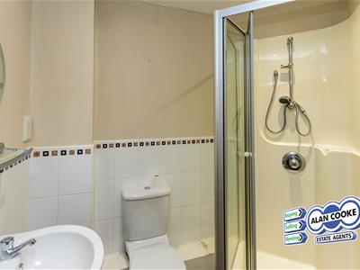 EN-SUITE SHOWER ROOM